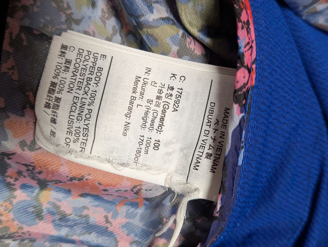 ナイキ ウィンドランナー プリンテッドフーディー