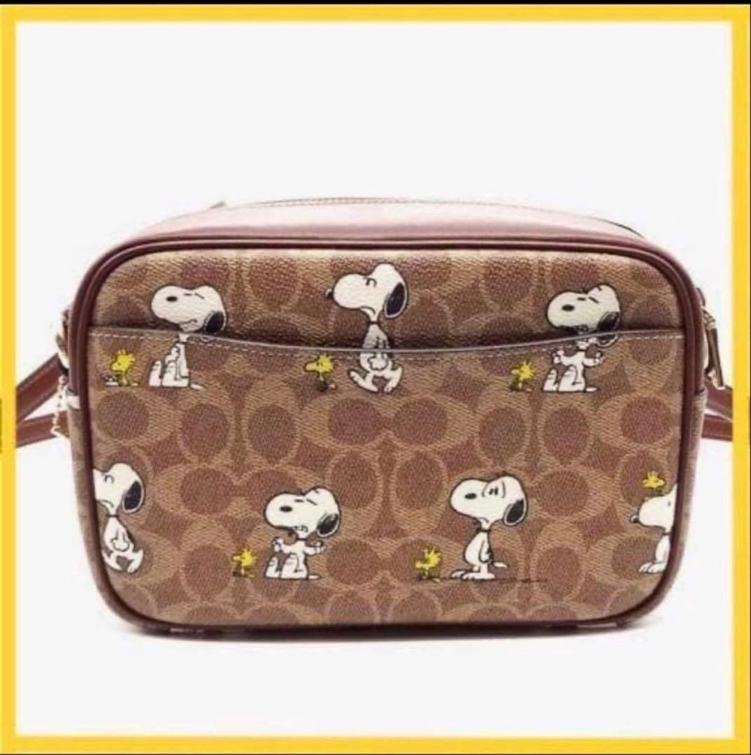 たおたろー　コーチCOACHスヌーピーコラボシグネチャー斜め掛けショルダー