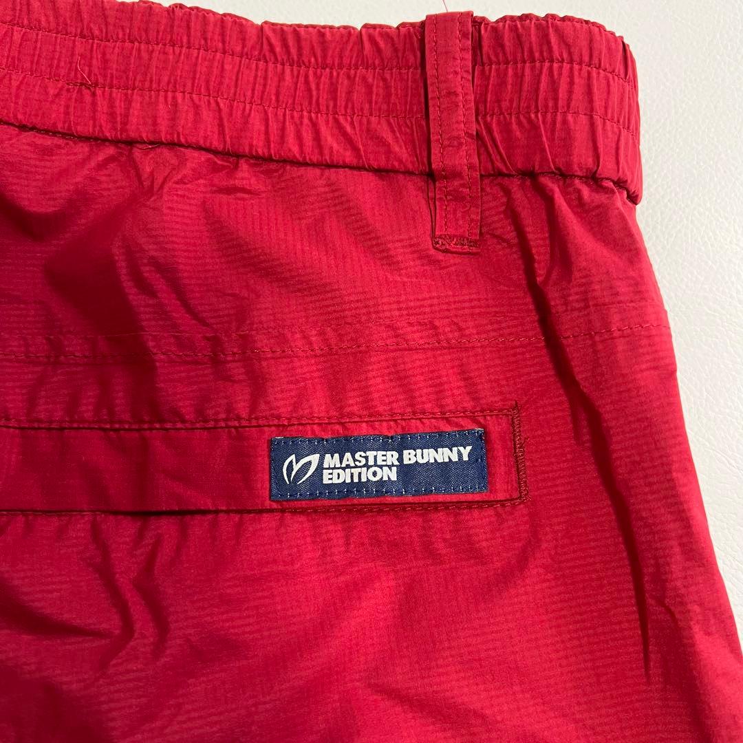 【レインウェア】マスターバニーエディション ゴルフパンツ 雨 耐水 レッド 総柄