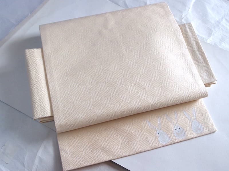 織りの名古屋帯（たれ先にうさぎ文）長383 手描き染　ガード加工済　正絹美品