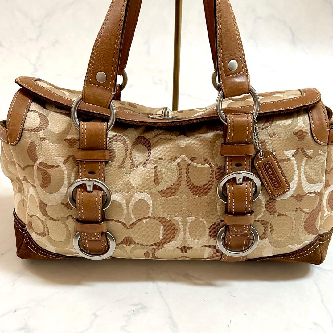 美品 コーチ ハンドバッグ シグネチャー チャーム付 レザー本革 ターンロック