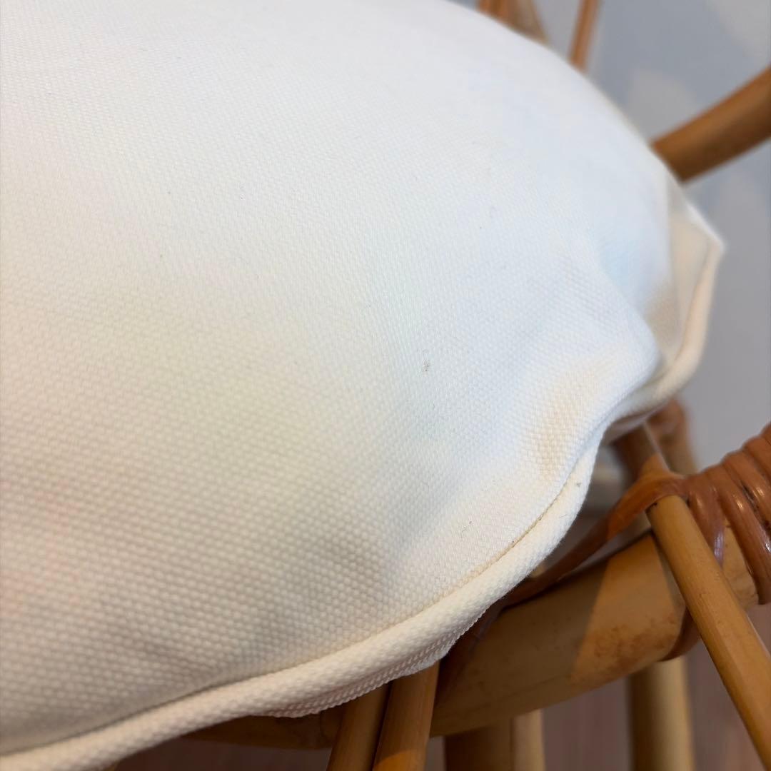ウニコ　カージュ　 ラタン製オープンチェア 白クッション