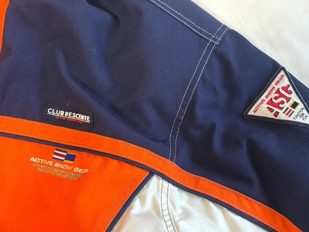 DESCENTEデサント スキースノーボードウェア オレンジ/ネイビー サイズO