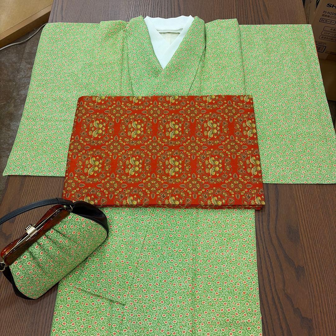 龍村美術織物-名古屋帯-赤￼地鴛鴦唐草柄￼