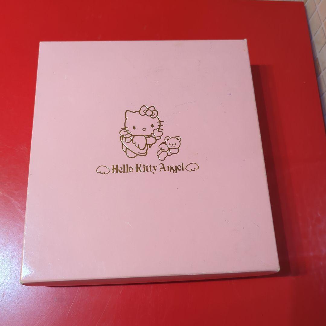 ハローキティのエンジェルキティシリーズのコーヒースプーンとスプーンレストのセット