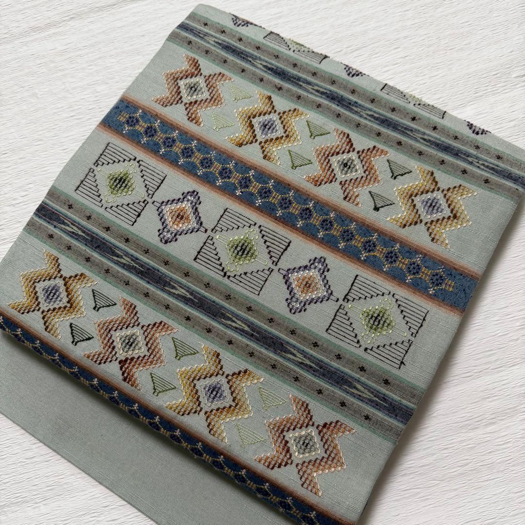 m-52 沖縄県指定無形文化財 読谷山花織 本場琉球 名古屋帯 正絹 極美品